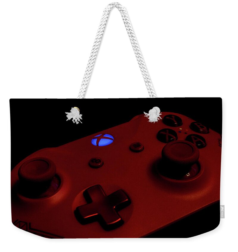 Xbox One Weekender Tote Bag featuring the photograph Sport Red Xbox Controller by Eric Hafner
