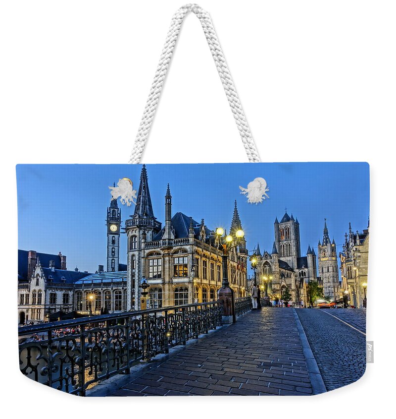 Ghent Weekender Tote Bag featuring the photograph St. Michael's Bridge at Blue Hour 1 by Patricia Caron