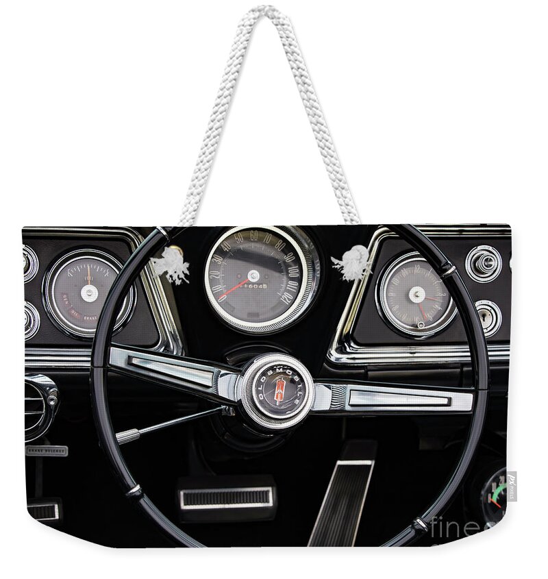Oldsmobile Weekender Tote Bag featuring the photograph Starfire Steering and Dash by Dennis Hedberg