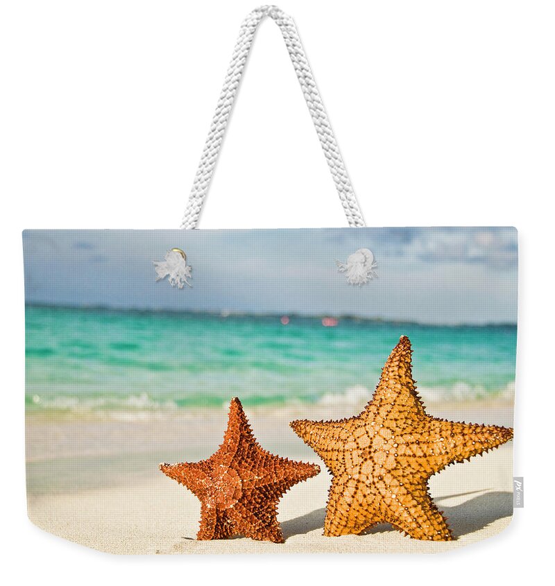 Shadow Weekender Tote Bag featuring the photograph Starfish On Tropical Caribbean Beach by Mehmed Zelkovic