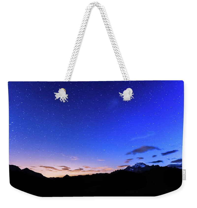 Dawn Weekender Tote Bag featuring the photograph Stars Over Mountains by Lightkey