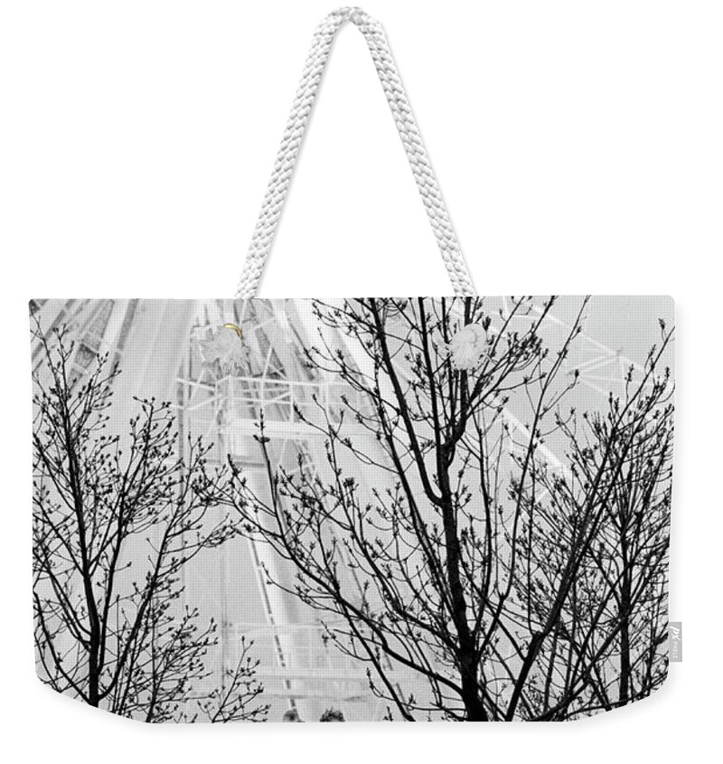 Statue Weekender Tote Bag featuring the photograph Statue And Ferris Wheel, Jardin Des by Walter Bibikow