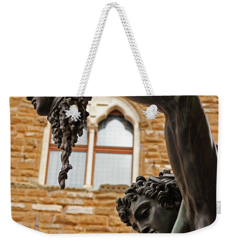 Arch Weekender Tote Bag featuring the photograph Statue Of Perseus Holding The Head Of by Trish Punch / Design Pics