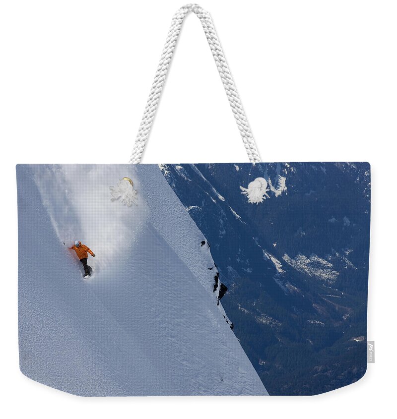 People Weekender Tote Bag featuring the photograph Steep Powder Turn Near Whistler, Bc by Russell Dalby Photography Www.russelldalby.com
