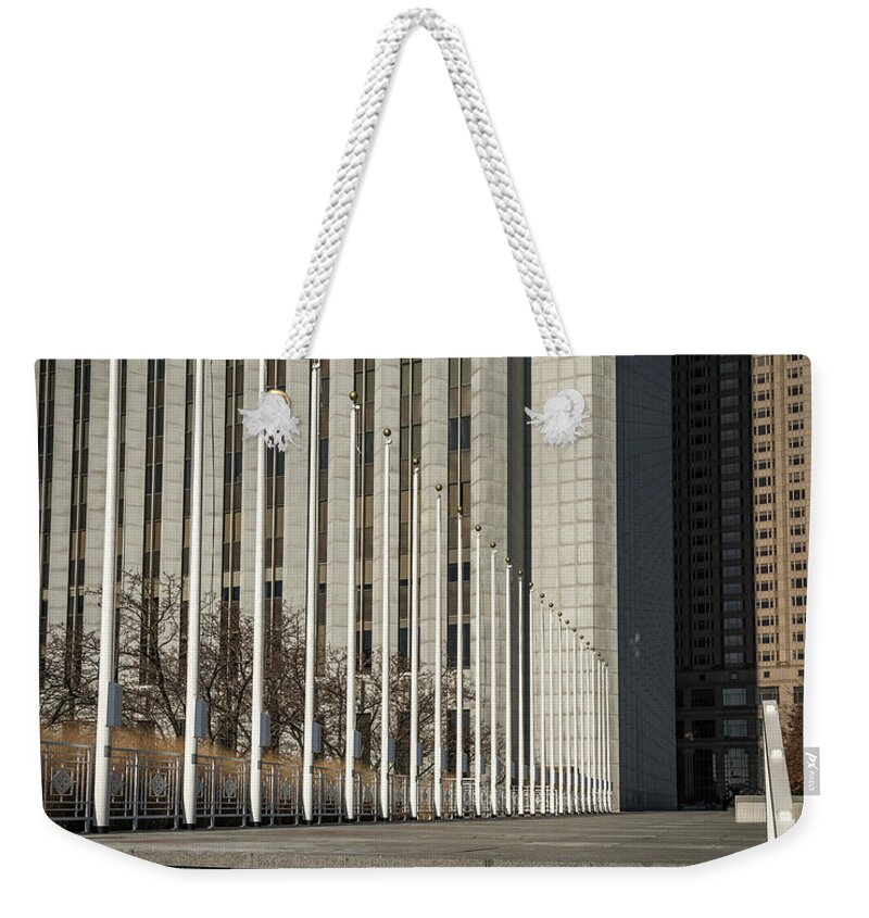 Architecture Weekender Tote Bag featuring the photograph Steps and Poles by Laura Hedien
