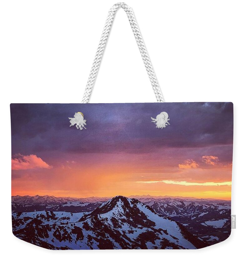 Colorado Weekender Tote Bag featuring the photograph Stormy Sunset by Kevin Schwalbe