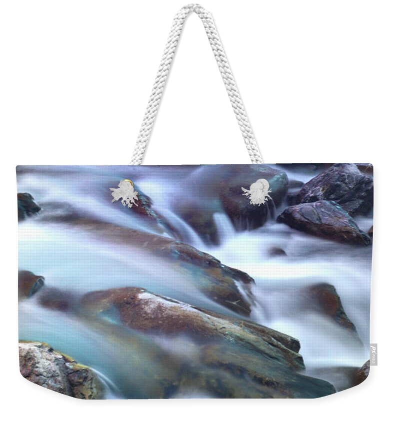 Scenics Weekender Tote Bag featuring the photograph Stream Among Rocks by Martial Colomb