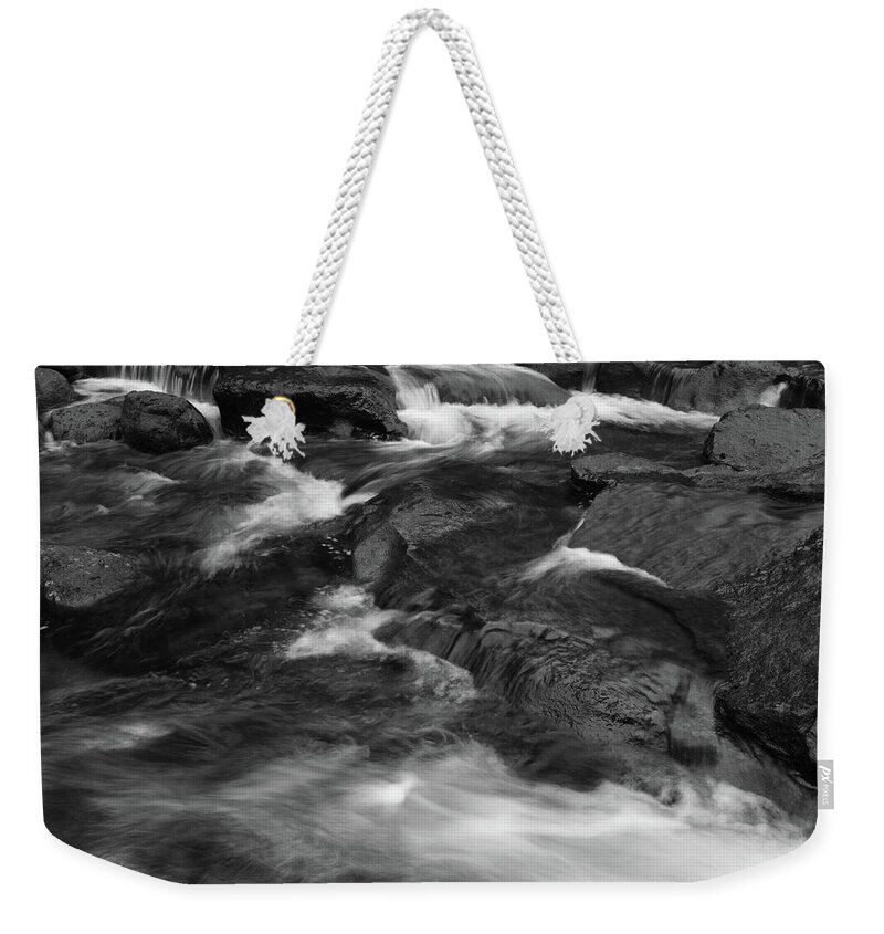 Stream Weekender Tote Bag featuring the photograph Stream flow by Les Cunliffe
