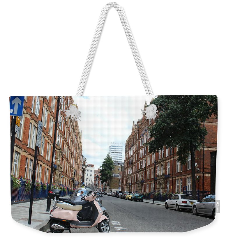 London Weekender Tote Bag featuring the photograph Street In London by Laura Smith