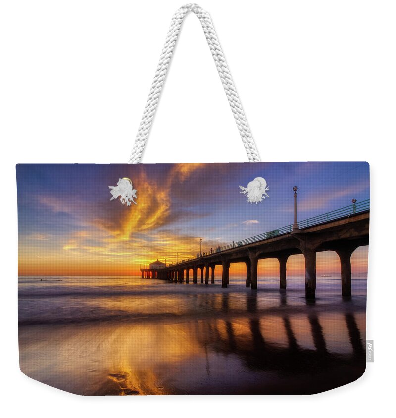 Beach Weekender Tote Bag featuring the photograph Stunning Sunset at Manhattan Beach Pier by Andy Konieczny