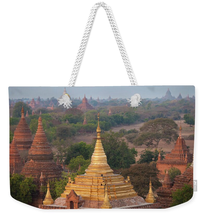 Scenics Weekender Tote Bag featuring the photograph Stupas And Temples In The Bagan by Mint Images - Art Wolfe