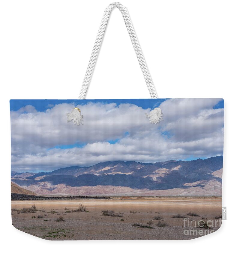 Desert Weekender Tote Bag featuring the photograph Sun and Shadow - Clark Dry Lake by Jeff Hubbard