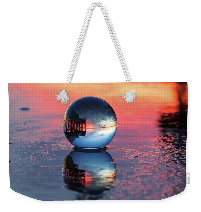 Crystal Globe Weekender Tote Bag featuring the photograph Sunrise at the beach by Darryl Hendricks