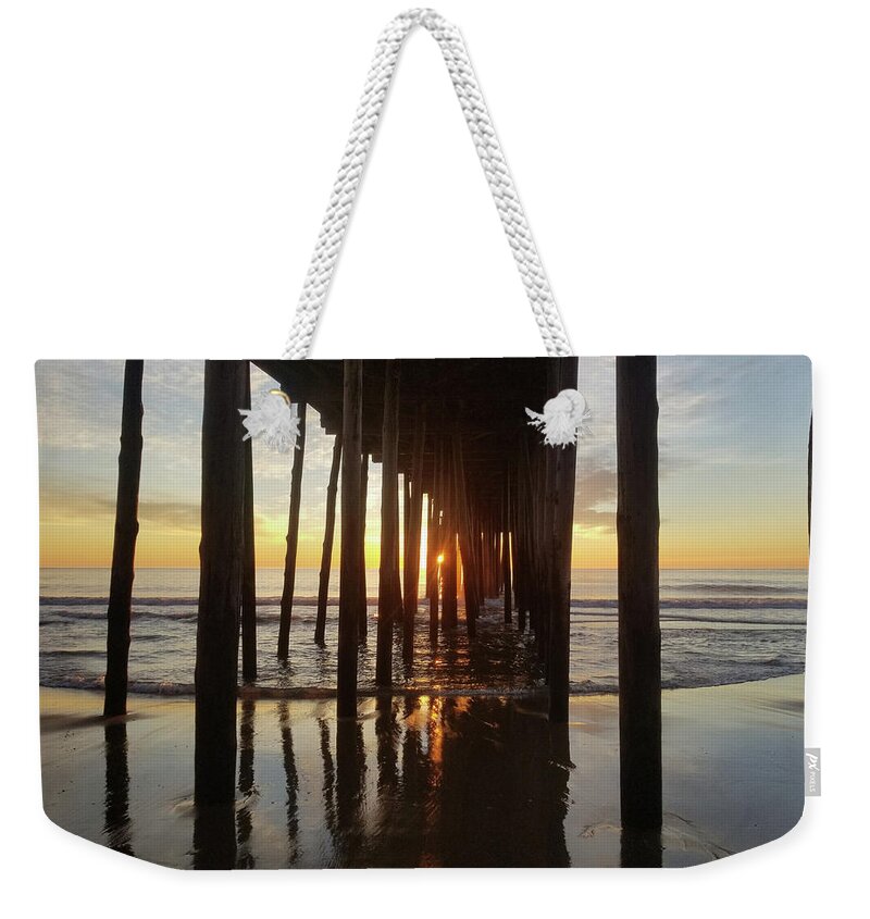 Beach Weekender Tote Bag featuring the photograph Sunrise At The OC Fishing Pier by Robert Banach