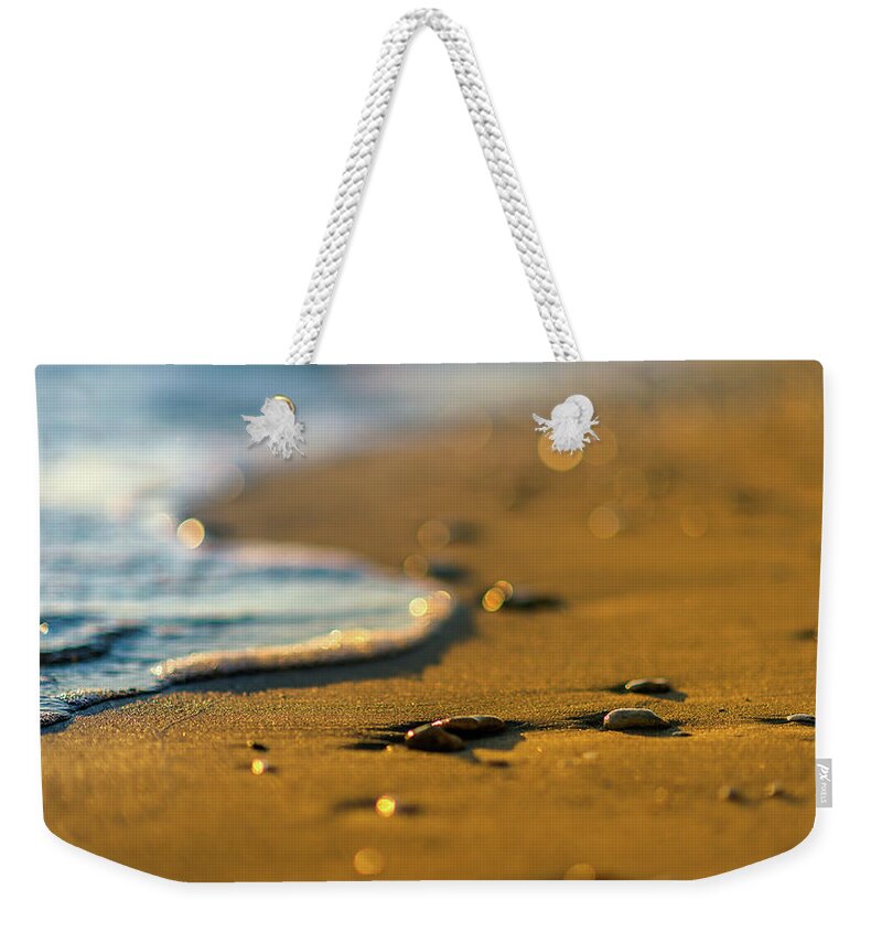 Tranquility Weekender Tote Bag featuring the photograph Sunrise Beach With Blue Water by (c) Dominic Cristofor