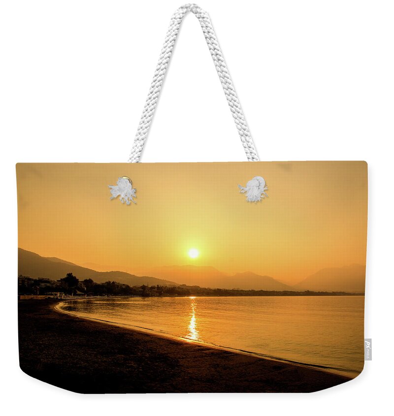 Sunrise Weekender Tote Bag featuring the photograph Sunrise on the beach of Alanya by Sun Travels