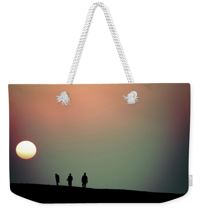 Taiwan Weekender Tote Bag featuring the photograph Sunset And The Three Men by Sen Lin Photography