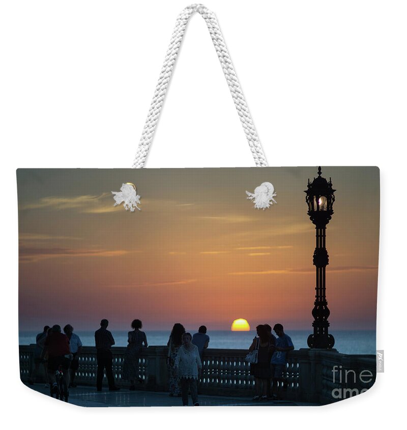 Romantic Weekender Tote Bag featuring the photograph Sunset at Alameda Promenade Cadiz Spain by Pablo Avanzini