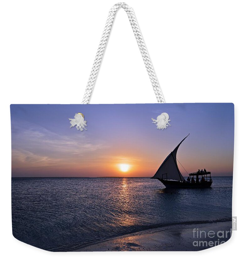 Sunset Weekender Tote Bag featuring the photograph Sunset at Zanzibar by Thomas Schroeder