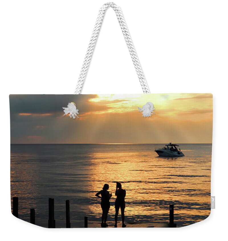 Sunset Conversation Weekender Tote Bag featuring the photograph Sunset Conversation by David T Wilkinson