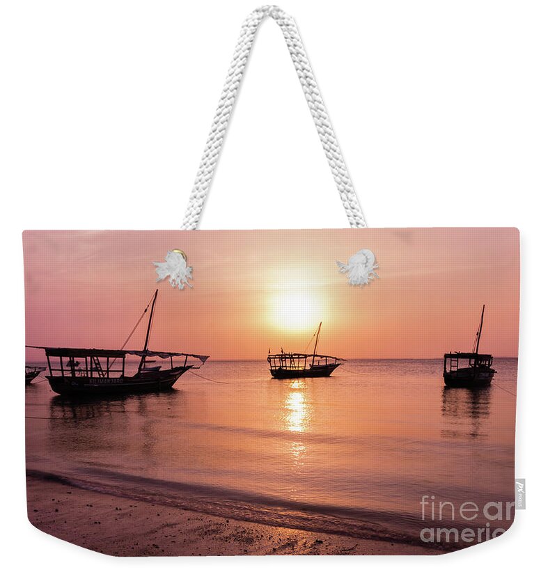 Sunset Weekender Tote Bag featuring the photograph Sunset in Zanzibar by Lyl Dil Creations