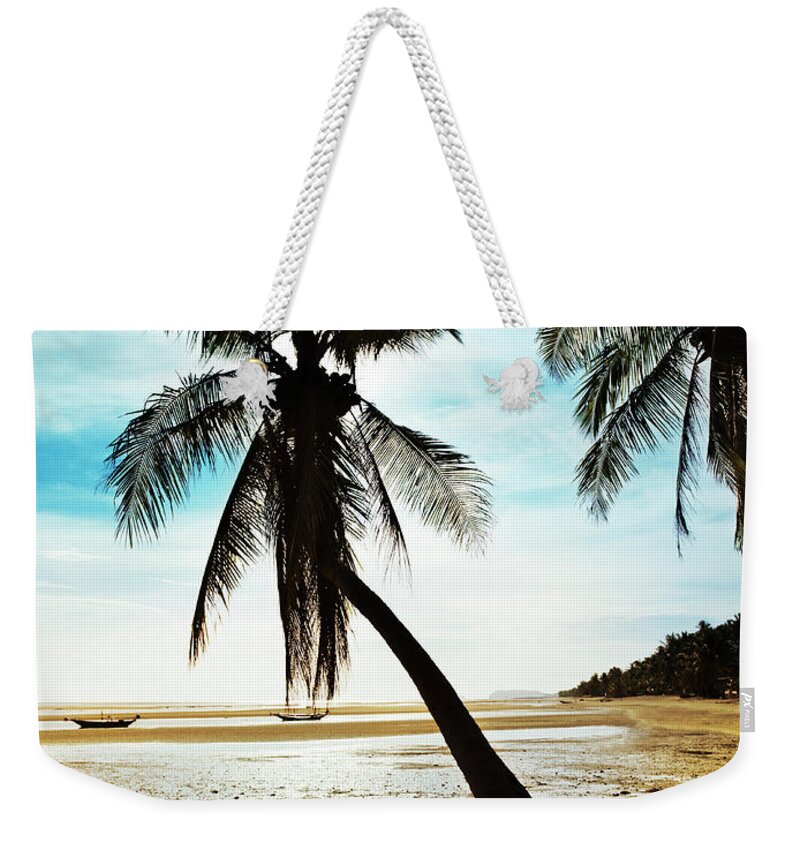 Scenics Weekender Tote Bag featuring the photograph Sunset On Beach With Palms by Henrik Sorensen