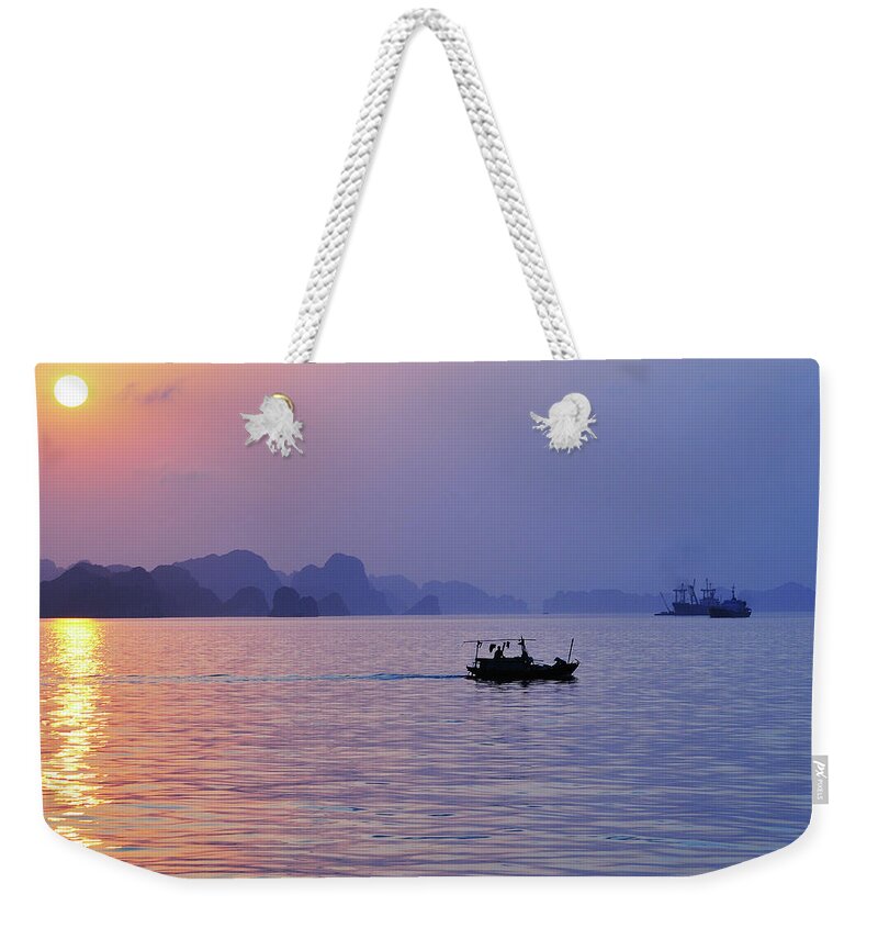 Scenics Weekender Tote Bag featuring the photograph Sunset On Halong Bay by Photo By Sayid Budhi