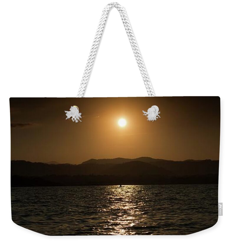 Sunset Weekender Tote Bag featuring the photograph Sunset on Malawi lake by Robert Grac