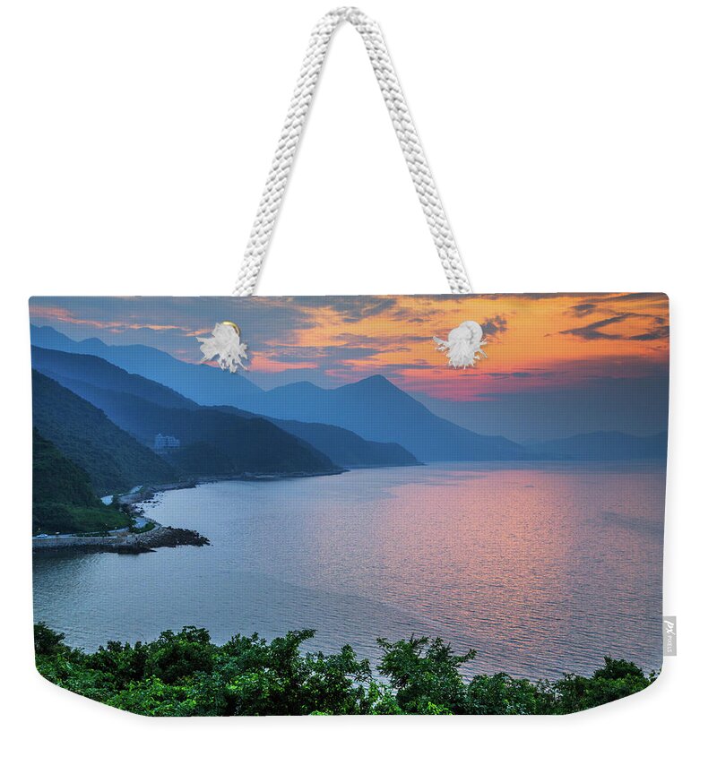 Scenics Weekender Tote Bag featuring the photograph Sunset Over The Coast Of Shenzhen, China by Feng Wei Photography