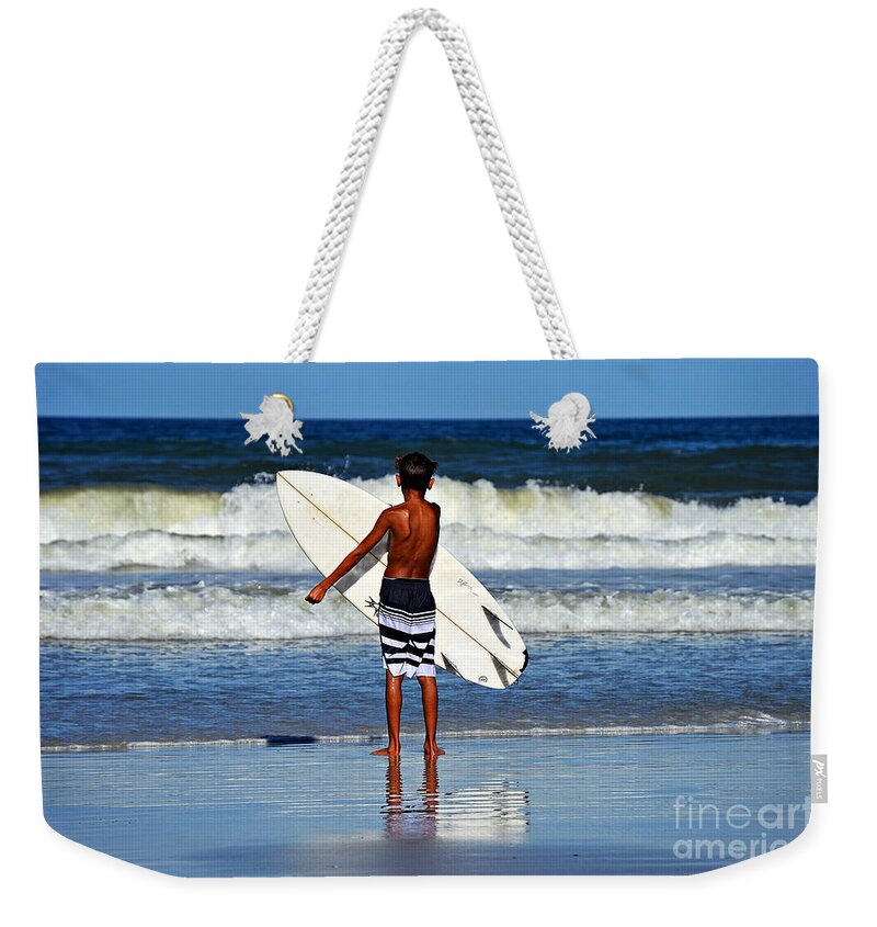 Surf Weekender Tote Bag featuring the photograph Surf Boy by Thomas Schroeder
