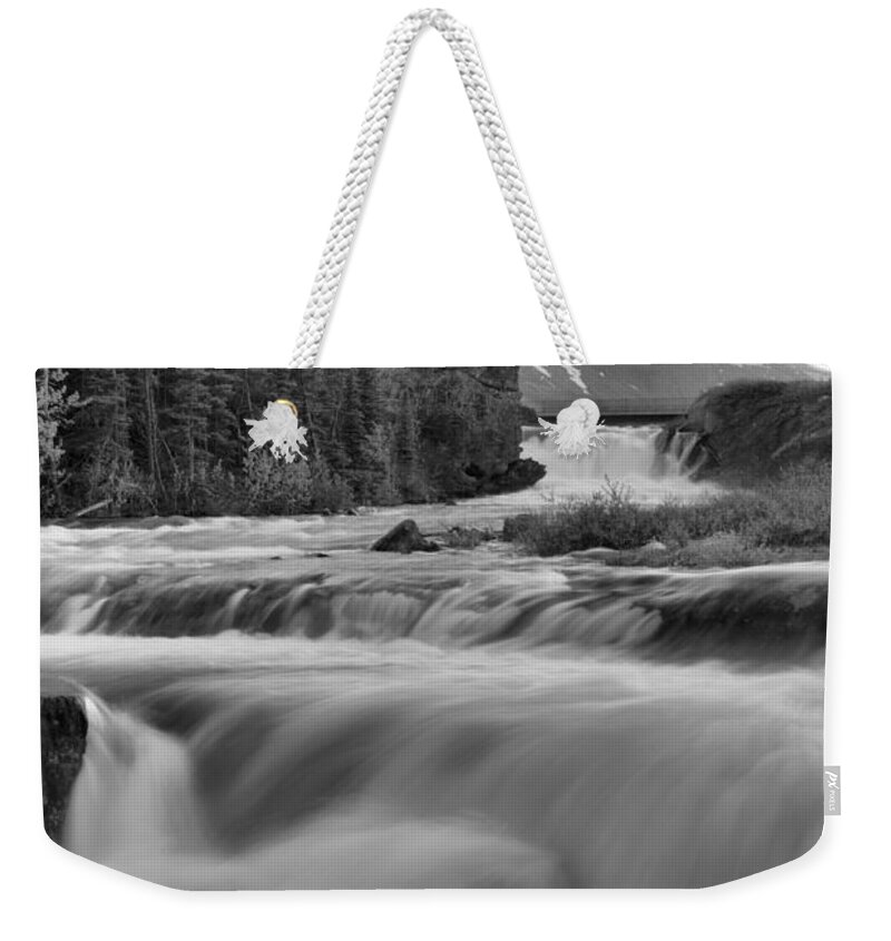 Swift Current Falls Weekender Tote Bag featuring the photograph Swiftcurrent Falls Spring SUnset Black And White by Adam Jewell