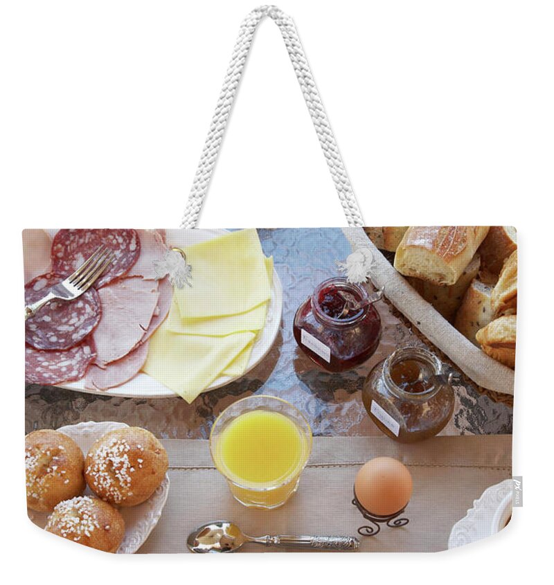 Cantaloupe Weekender Tote Bag featuring the photograph Table Laid With Breakfast by Easy Production