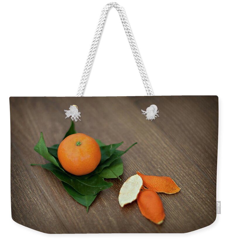 Wood Weekender Tote Bag featuring the photograph Tangerine by Carla Corigliano
