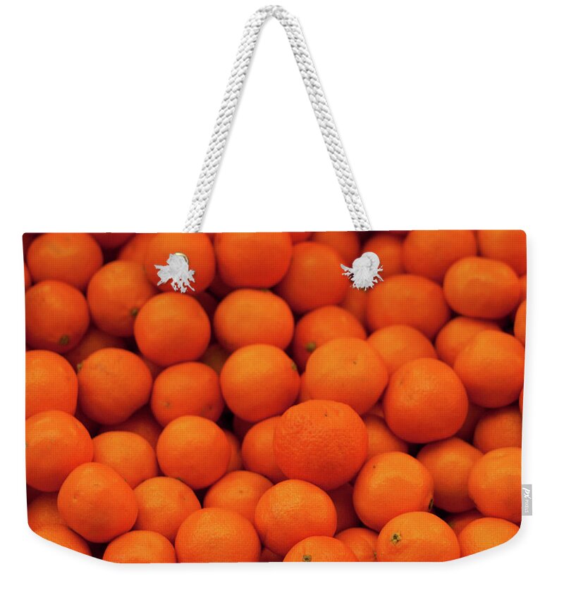 Araucania Region Weekender Tote Bag featuring the photograph Tangerine by Philippe Thiers