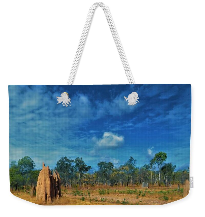 Weipa Weekender Tote Bag featuring the photograph Termite Mounds On the Peninsular Developmental Road by Joan Stratton