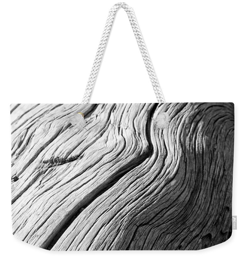 Shadow Weekender Tote Bag featuring the photograph Textured Dry Log Background In by Peskymonkey