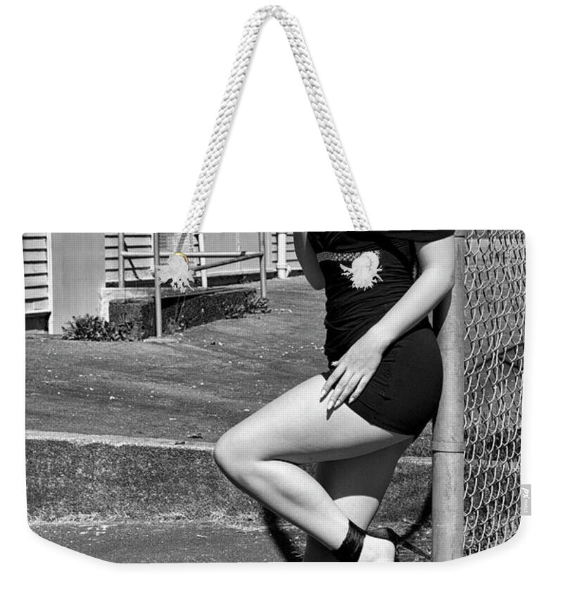 Female Weekender Tote Bag featuring the photograph The Backyard Fence by Doug Matthews