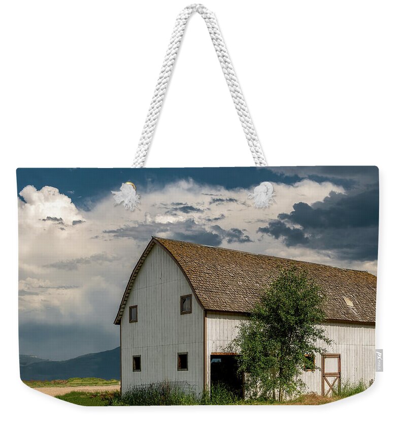 White Barn Weekender Tote Bag featuring the photograph The Big White Barn by Marcy Wielfaert