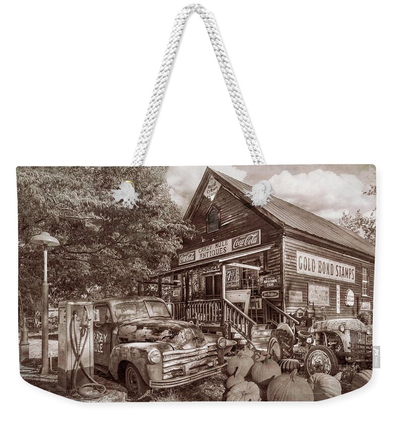 1947 Weekender Tote Bag featuring the photograph The Crazy Mule Antiques in Sepia by Debra and Dave Vanderlaan