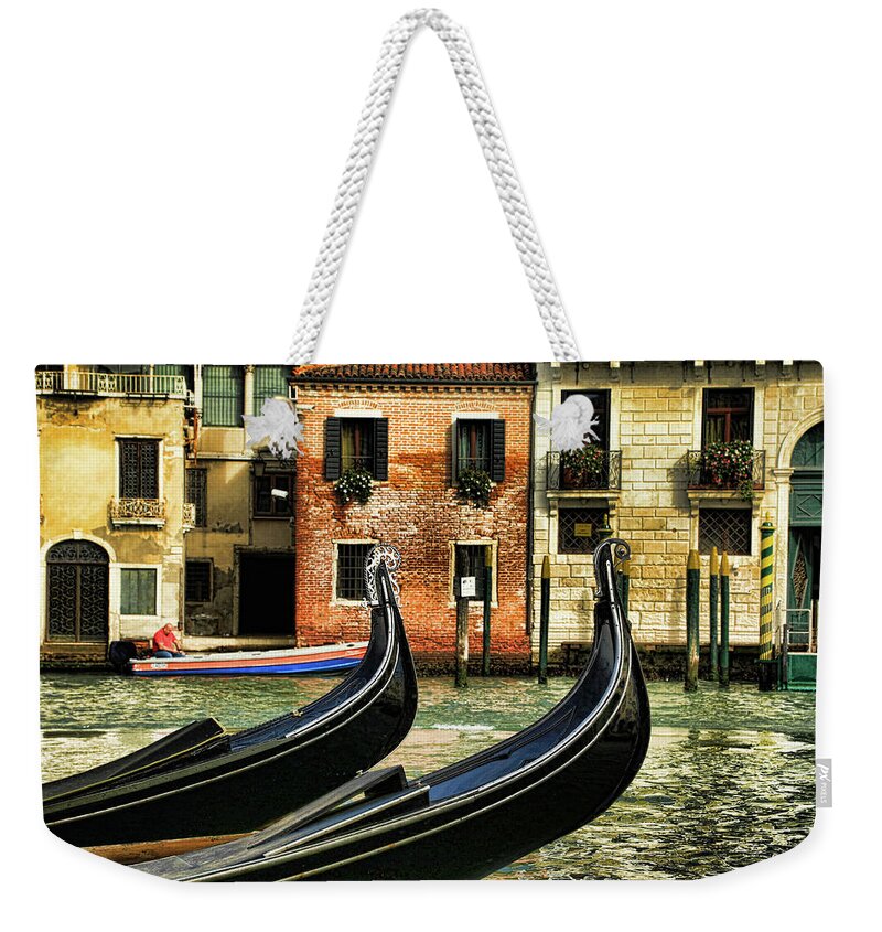 Venice Weekender Tote Bag featuring the photograph The Dancing Gondolas by Mary Buck