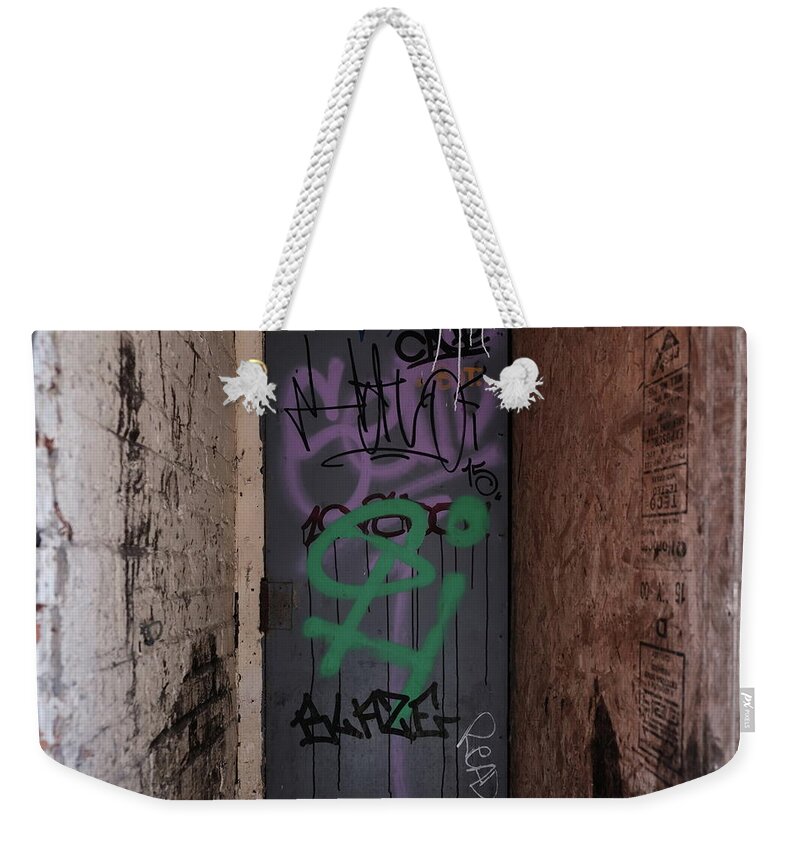 Urban Weekender Tote Bag featuring the photograph The Depth Of Door by Kreddible Trout