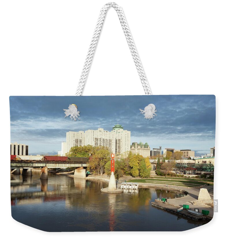 Downtown District Weekender Tote Bag featuring the photograph The Forks Winnipeg by Mysticenergy