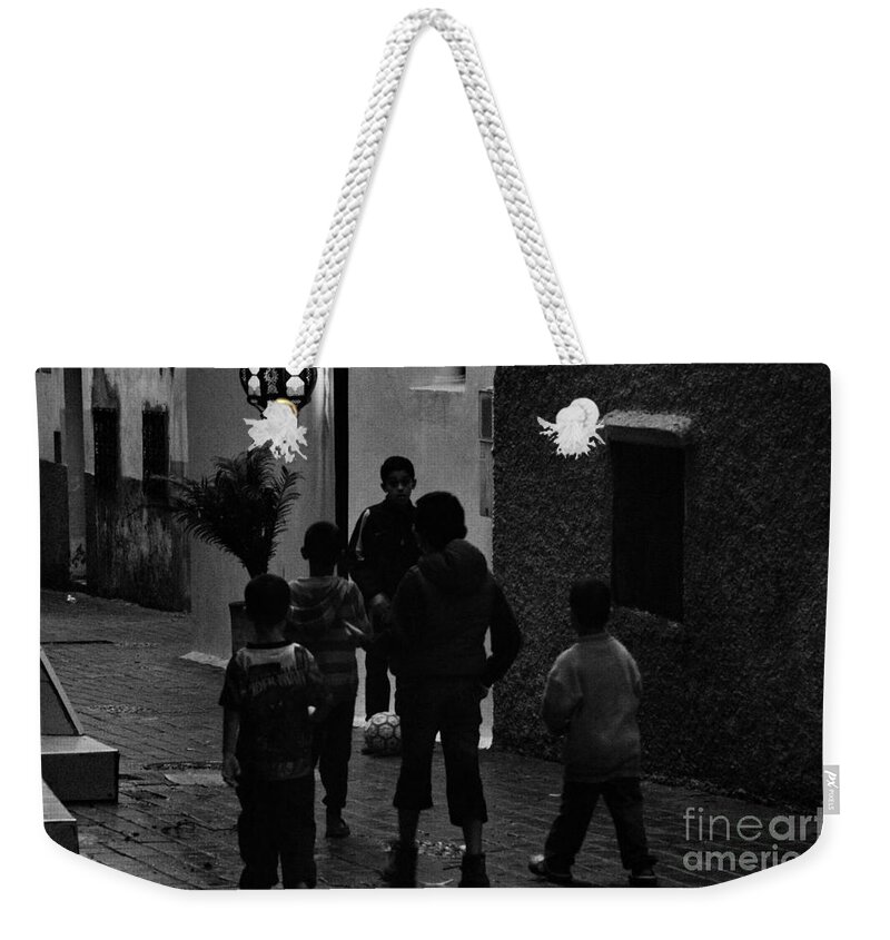 Children Weekender Tote Bag featuring the photograph The game in Tangiers - black and white by Yavor Mihaylov