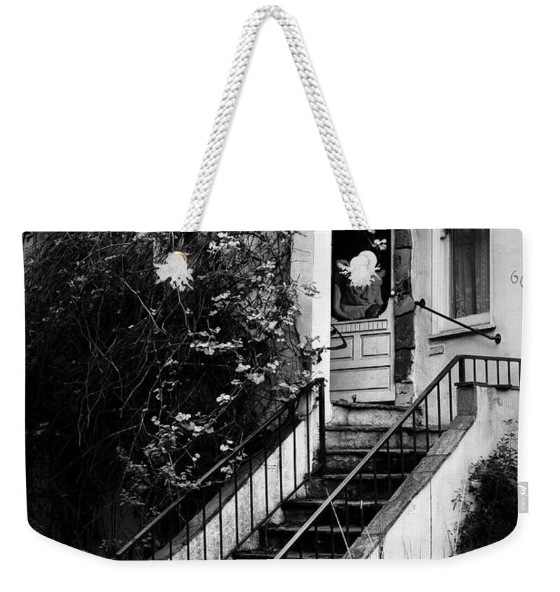 Black And White Weekender Tote Bag featuring the photograph The Gargoyle at House 666 by Mary Lee Dereske