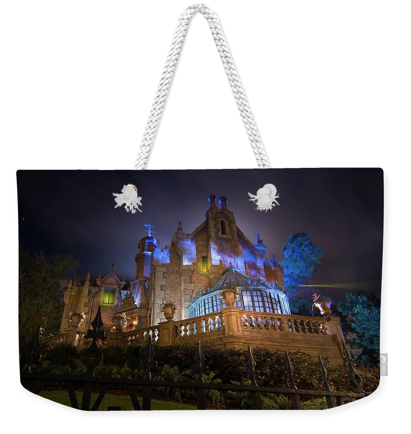 Disney Haunted Mansion Weekender Tote Bag featuring the photograph The Haunted Mansion at Walt Disney World by Mark Andrew Thomas