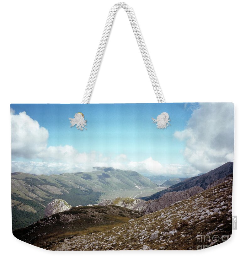 At Weekender Tote Bag featuring the photograph The path of my Destiny by Fabrizio Ruggeri