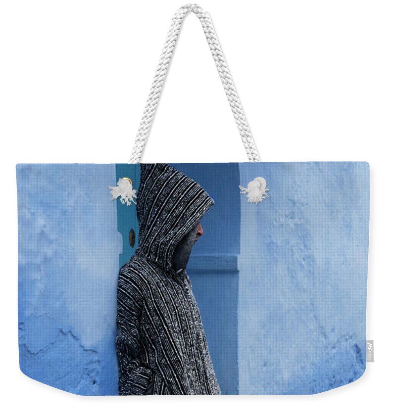 Chefchaouen Weekender Tote Bag featuring the photograph The Quiet Man by Jessica Levant