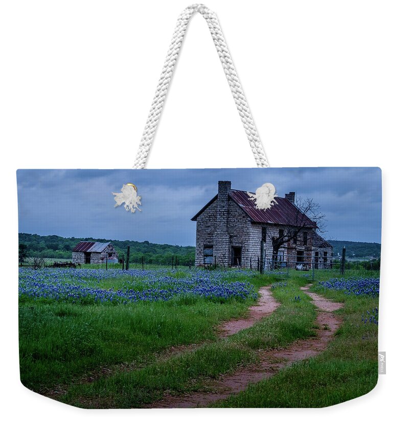 A Dirt Road Leads To A Charming 1800 Era Stone House In The Texas Hill Country As An Evening Storm Rolls In. Weekender Tote Bag featuring the photograph The Road Home by Johnny Boyd