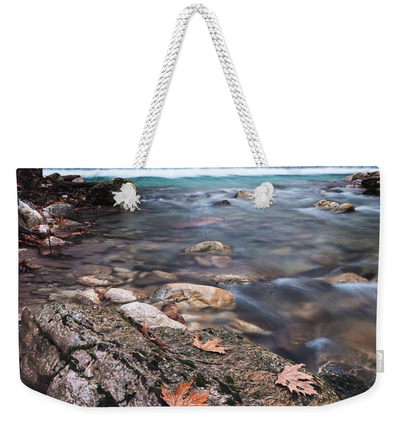 Greece Weekender Tote Bag featuring the photograph The Rock And The Water by Elias Pentikis