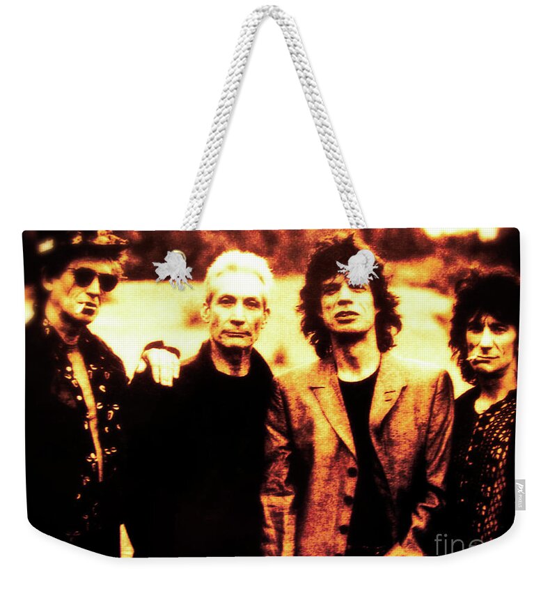 The Rolling Stone Weekender Tote Bag featuring the photograph The Rolling Stones by Doc Braham